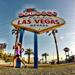 Jen Delucchi running past the Welcome to Las Vegas Sign