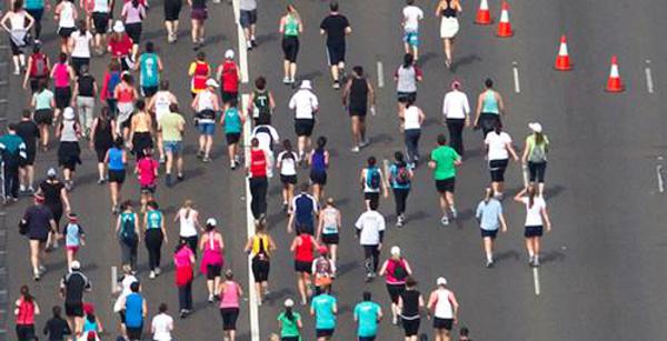 Overhead shot of runners on a highway