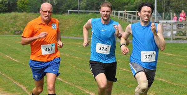 Three men running