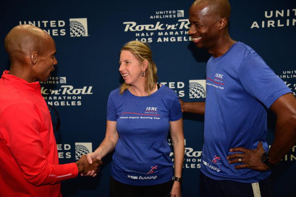 Regine Sediva and David Francis Jr. meet Meb Keflezighi at the 2017 United Airlines Rock ‘n’ Roll Los Angeles Health & Fitness Expo. Sediva ran the Boston Marathon in 2014, the same year that Keflezighi won the race.