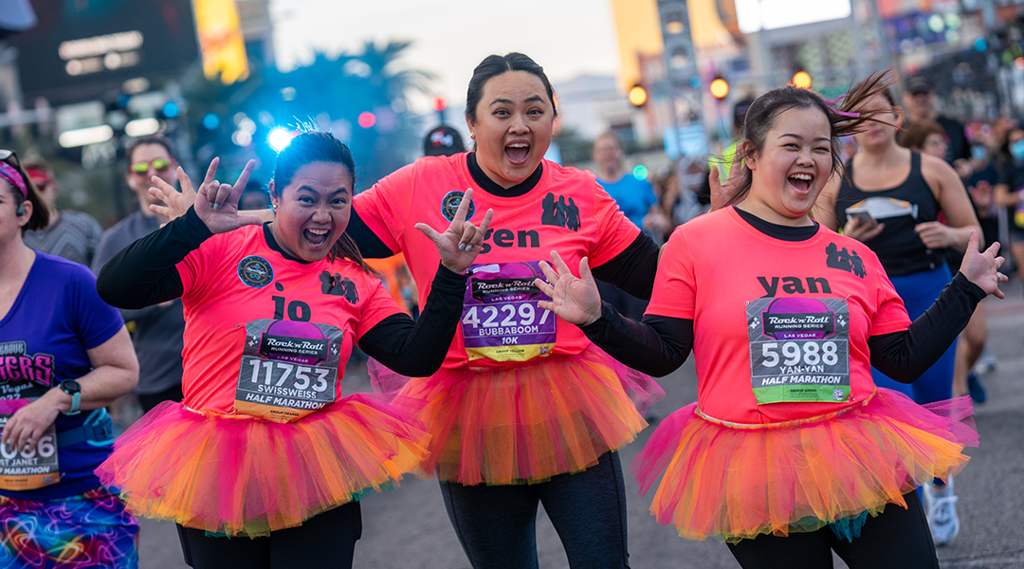 runners wearing colored tutus